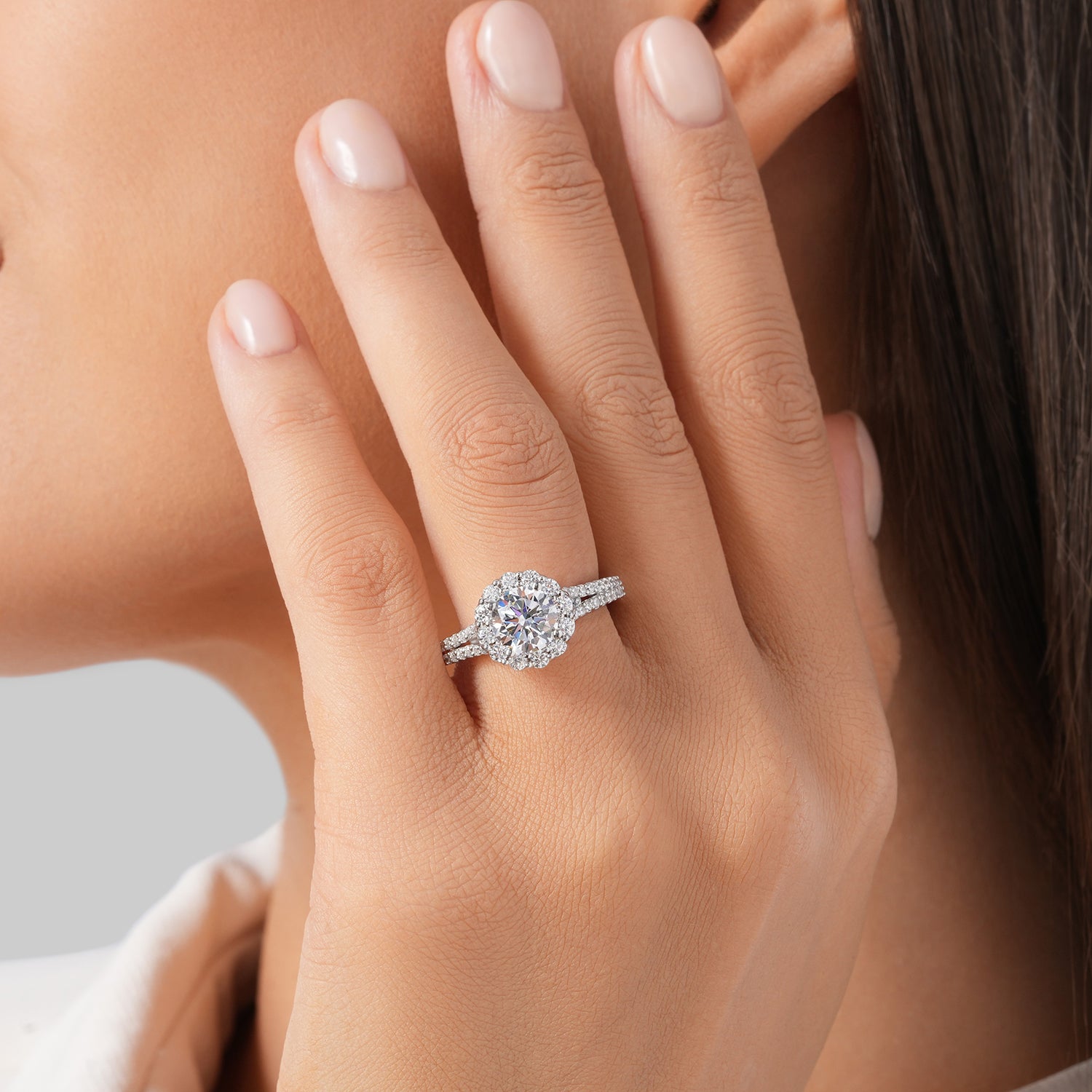 Intricate Star-Shaped Halo & Oval Diamond Engagement Ring